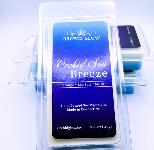 Orchid Glow Orchid Sea Breeze wax melts packaging on a white background