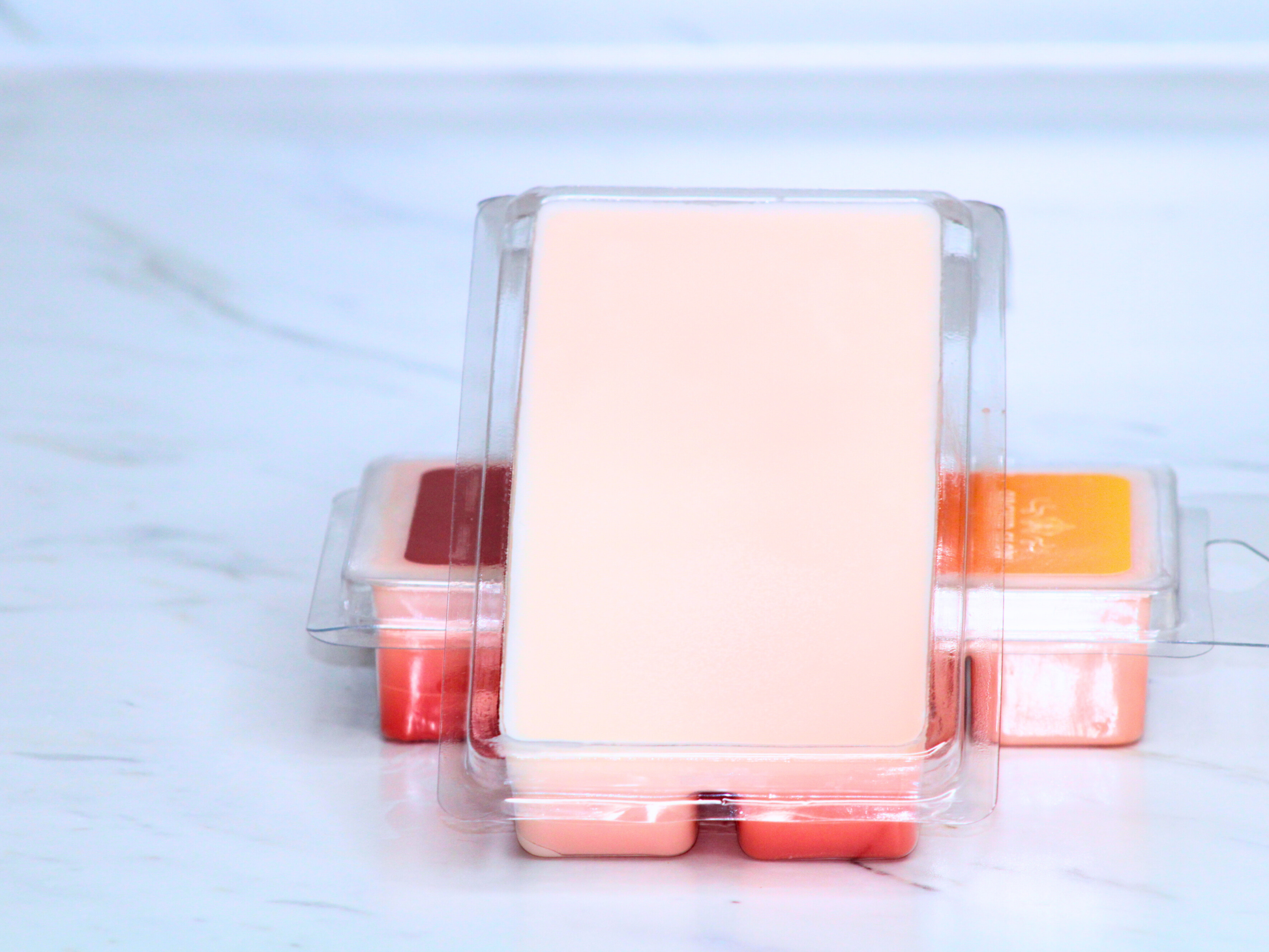 Set of clear containers on a marble surface